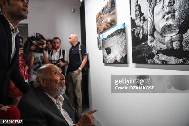 Legendary Turkish photographer Ara Guler , looks to his exhibition on August 16, 2018 during at the opening of Ara Guler museum in Istanbul. -...