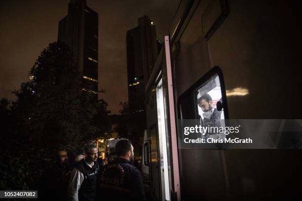 Turkish forensic police prepare to enter the back garage entrance of the Saudi Arabian consulate after moving the investigation from the Saudi...