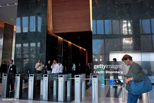 Workers walk inside the Ventura Corporate Towers development, a joint real estate project between Camargo Correa Desenvolvimento Imobilario SA and...