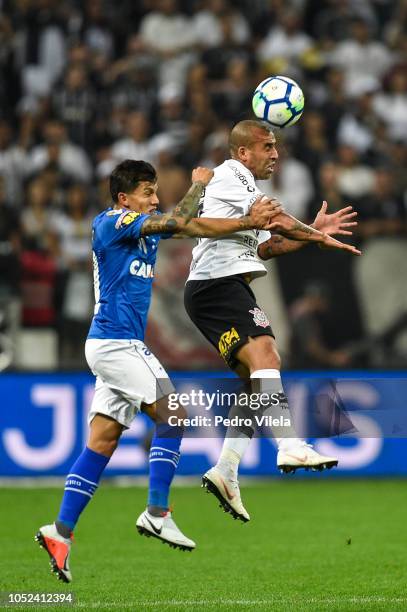 Emerson of Corinthians and Lucas Romero of Cruzeiro battle for the ball during a match between Corinthians and Cruzeiro as part of Copa do Brasil...