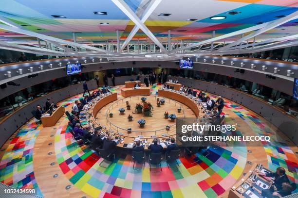 This picture shows a general view of European Union leaders attending the second day of a EU summit at the European Council in Brussels on October...