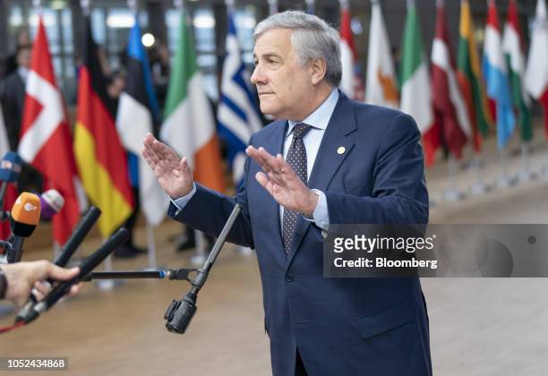 Antonio Tajani, president of the European Parliament, gestures while speaking to reporters as he arrives for a European Union leaders summit in...