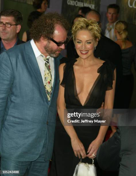 Mike Figgis - Director & Sharon Stone during "Cold Creek Manor" Premiere at El Capitan Theatre in Hollywood, California, United States.