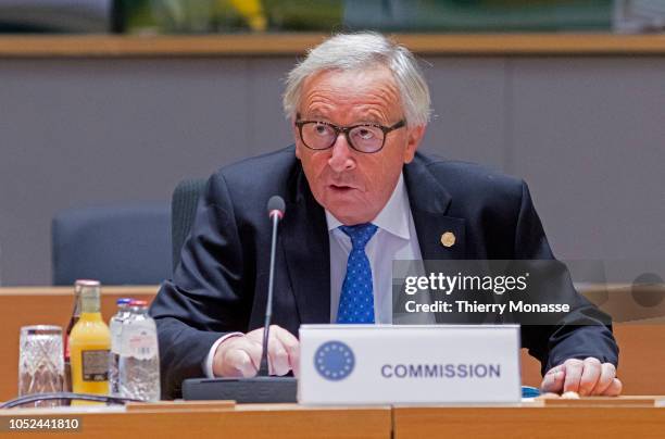 President of the European Commission Jean-Claude Juncker is playing with the microphone during an EU chief of state summit in the Europa, the EU...