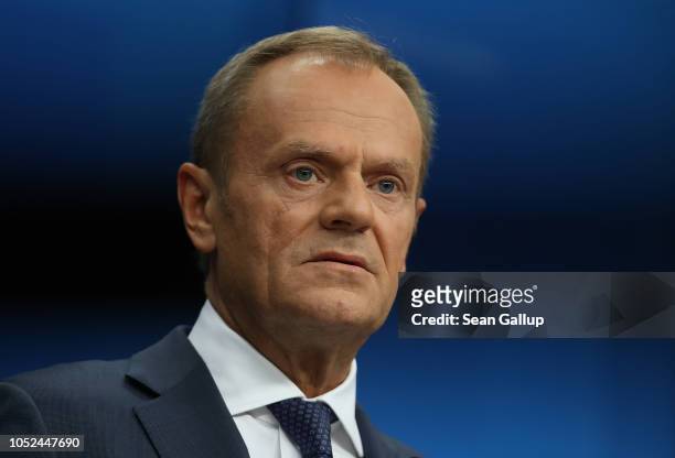 European Council President Donald Tusk speaks to the media following the October EU summit on October 18, 2018 in Brussels, Belgium. British Prime...