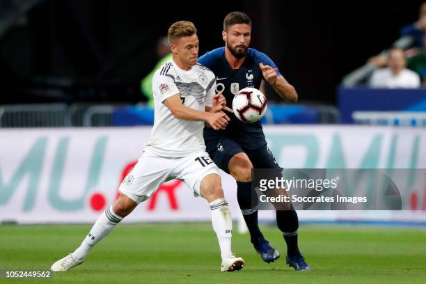 Joshua Kimmich of Germany, Olivier Giroud of France during the UEFA Nations league match between France v Germany at the Stade de France on October...