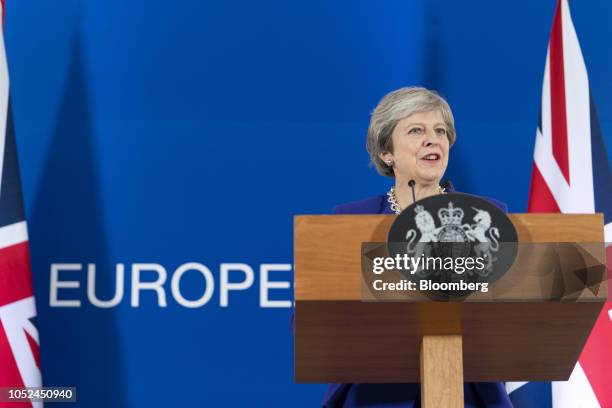 Theresa May, U.K. Prime minister, speaks during a news conference at a European Union leaders summit in Brussels, Belgium, on Thursday, Oct. 18,...