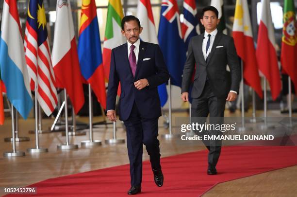 Sultan of Brunei Haji Hassanal Bolkiah is accompanied by his son Prince Abdul Mateen as he arrives for a Asia Europe Meeting at the European Council...