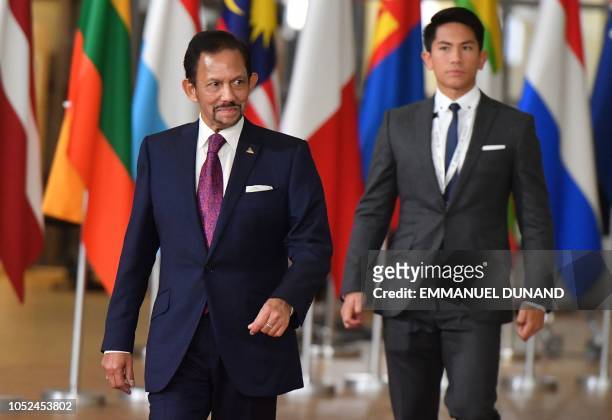 Sultan of Brunei Haji Hassanal Bolkiah is accompanied by his son Prince Abdul Mateen as he arrives for a Asia Europe Meeting at the European Council...