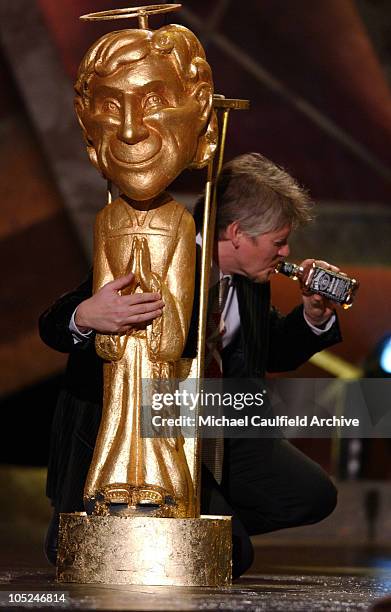 Dave Foley presents the award for Funniest Movie Actress of the Year at Comedy Central's First Annual Commie Awards