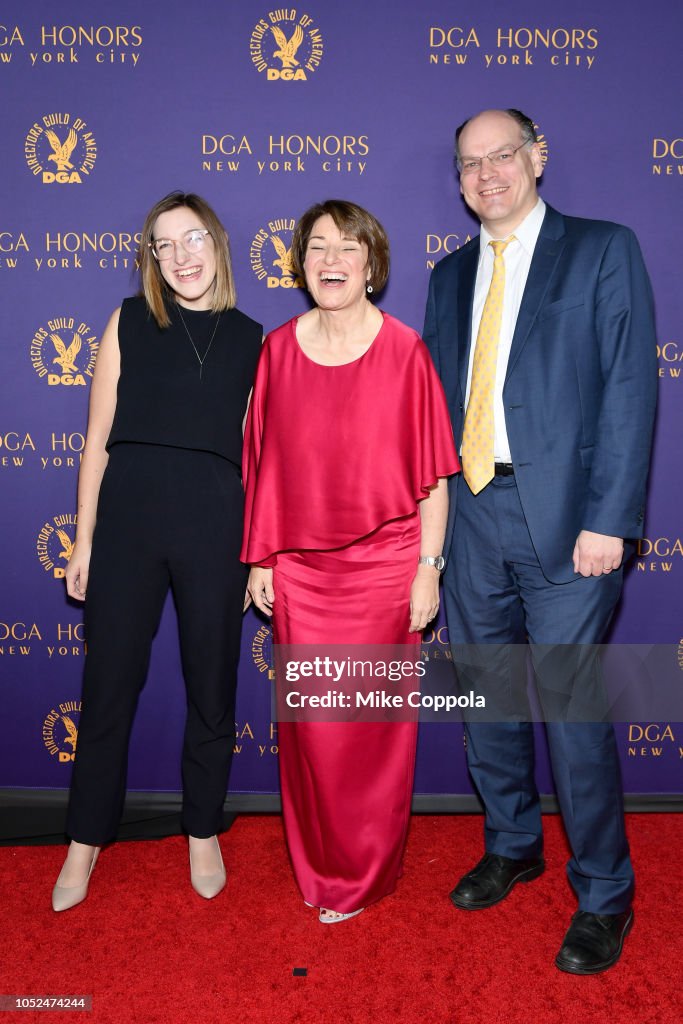 Abigail Klobuchar Bessler, Amy Klobuchar and John Bessler attend the