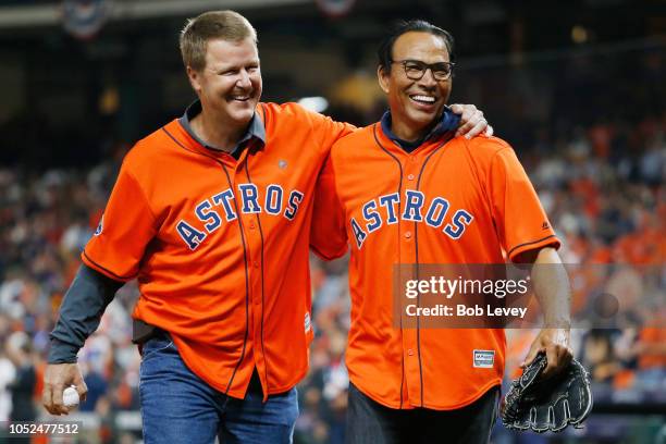Former Houston Astros players Jeff Kent and Jose Cruz react after the ceremonial first pitch before Game Five of the American League Championship...