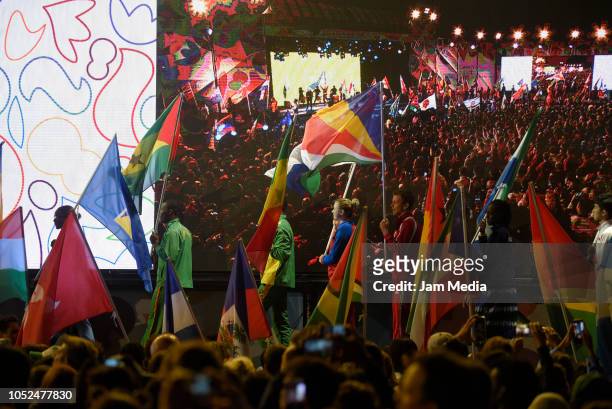 Standard bearers are seen on stage while parading on day 12 during the closing ceremony of Buenos Aires 2018 Youth Olympic Games at Youth Olympic...