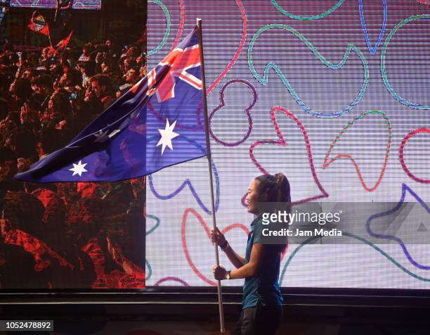 Australia standard bearer walks on day 12 during the closing ceremony of Buenos Aires 2018 Youth Olympic Games at Youth Olympic Park Villa Soldati on...