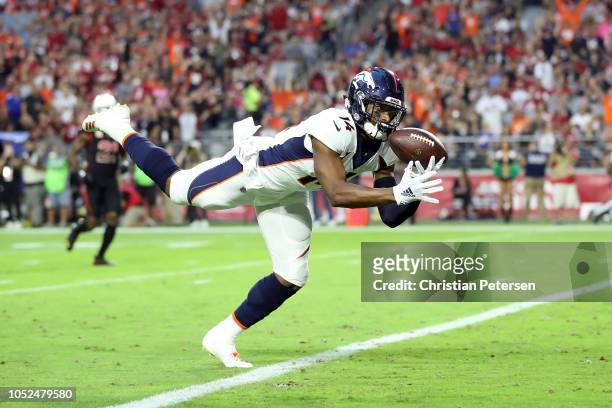 Wide receiver Courtland Sutton of the Denver Broncos scores a 28-yard touchdown during the first quarter against the Arizona Cardinals at State Farm...