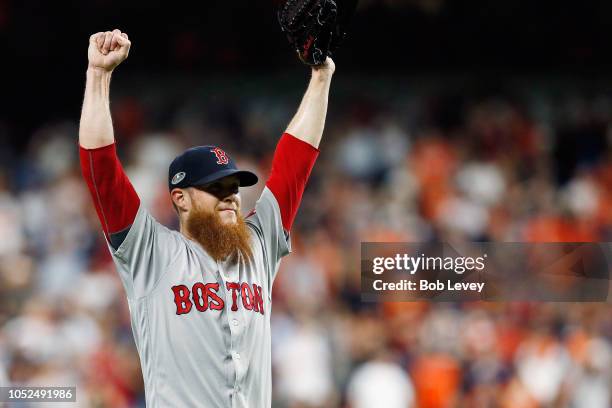 Craig Kimbrel of the Boston Red Sox celebrates defeating the Houston Astros 4-1 in Game Five of the American League Championship Series to advance to...