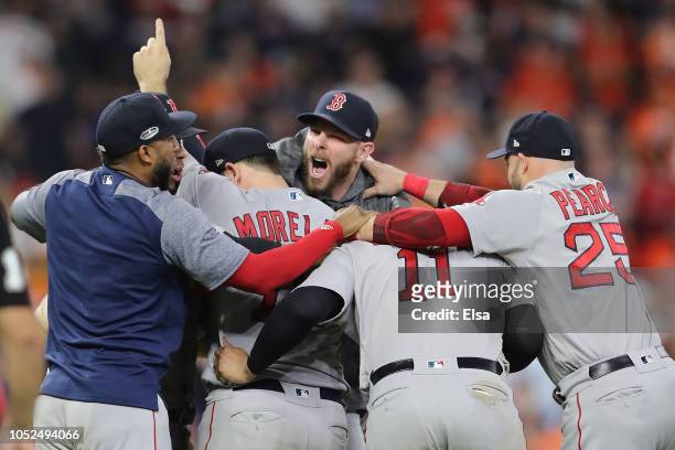 Chris Sale and the Boston Red Sox celebrate defeating the Houston Astros 4-1 in Game Five of the American League Championship Series to advance to...
