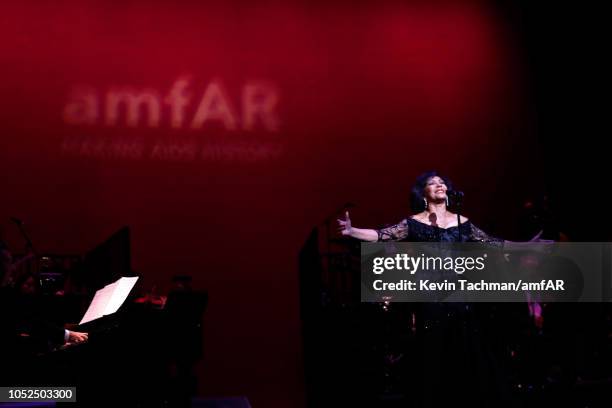 Dame Shirley Bassey performs onstage at amfAR Los Angeles 2018 at Wallis Annenberg Center for the Performing Arts on October 18, 2018 in Beverly...