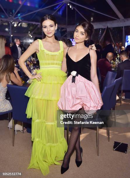 Victoria Justice and Sarah Hyland attend the amfAR Gala Los Angeles 2018 at Wallis Annenberg Center for the Performing Arts on October 18, 2018 in...