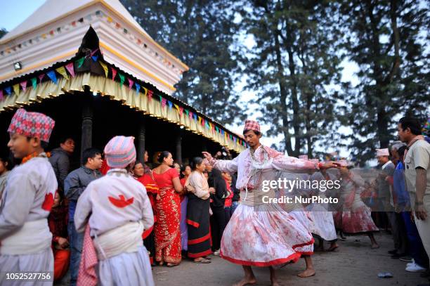Nepalese Hindu priests perform a ritual dance during the tenth day of Dashain Durga Puja Festival in Bramayani Temple, Bhaktapur, Nepal on Friday,...