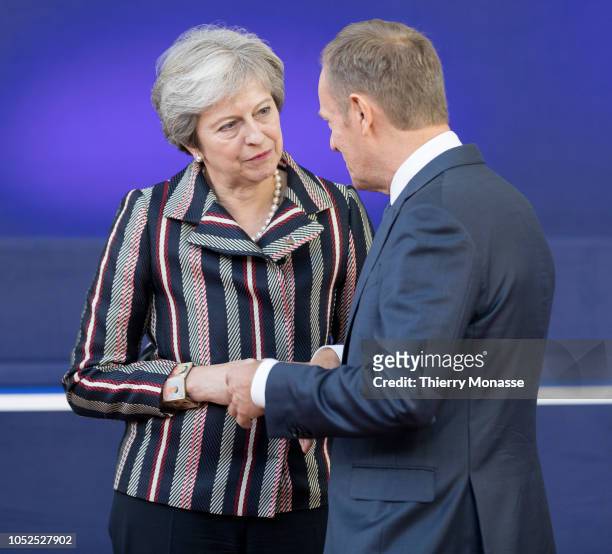 Prime Minister of the United Kingdom Theresa May talks with the President of the European Council Donald Franciszek Tusk after the family photo of...