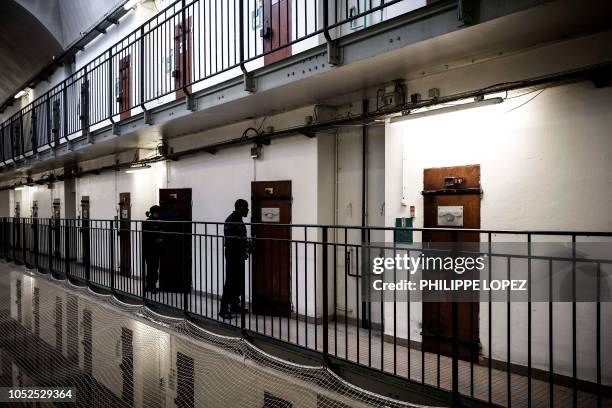 Prison guards open cells at Fresnes Prison in Fresnes, near Paris, on October 17, 2018.