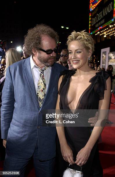 Mike Figgis, Director and Sharon Stone during "Cold Creek Manor" Premiere - Red Carpet at El Capitan Theatre in Hollywood, California, United States.