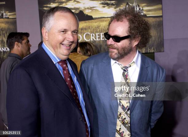 Diseny's Dick Cook and Director Mike Figgis during "Cold Creek Manor" Premiere - Red Carpet at El Capitan Theatre in Hollywood, California, United...