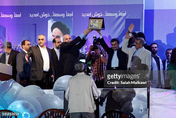 Iranian President Mahmoud Ahmadinejad is welcomed in the southern suburb of Beirut on October 13, 2010 in Lebanon. The controversial two-day official...
