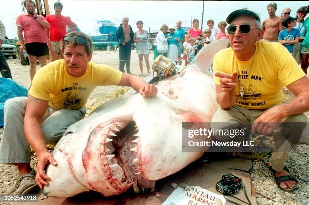 Pound great white shark nicknamed "Big Guy," landed by Montauk's famous skipper Frank Mundus, right, and Donnie Braddick on August 7, 1986.