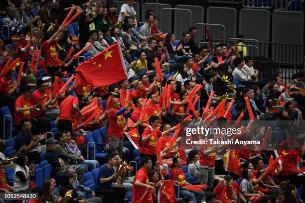 Chinese fans cheer during the FIVB Women's World Championship semi final between China and Italy at Yokohama Arena on October 19, 2018 in Yokohama,...