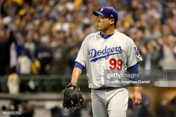 Hyun-Jin Ryu of the Los Angeles Dodgers reacts against the Milwaukee Brewers during the first inning in Game Six of the National League Championship...