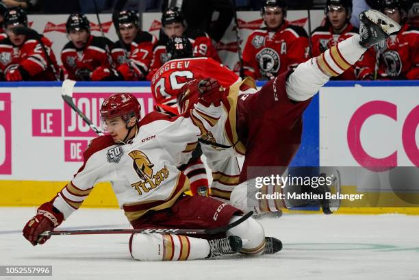 Marc-Andre LeCouffe collides with his teammate Liam Murphy against the Quebec Remparts during their QMJHL hockey game at the Videotron Center on...