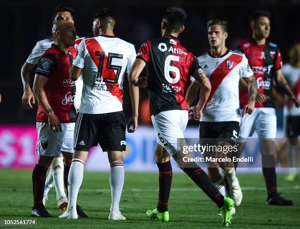 Exequiel Palacios of River Plate argues with Clemente Rodriguez of Colon during a match between Colon and River Plate as part of Superliga 2018/19 at...