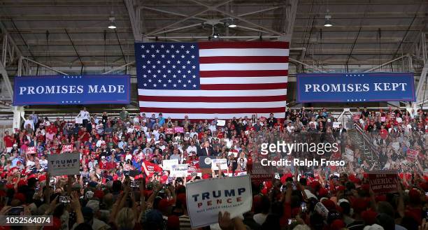 President Donald Trump speaks to a crowd of supporters during a rally at the International Air Response facility on October 19, 2018 in Mesa,...