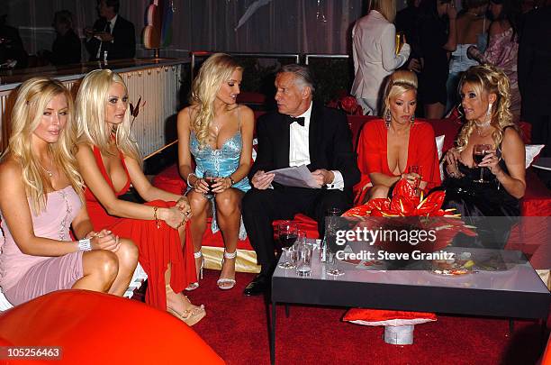 Hugh Hefner and Playboy Bunnies during The 61st Golden Globe Awards - NBC Access Hollywood After Party at The Stardust Room at The Beverly Hilton in...