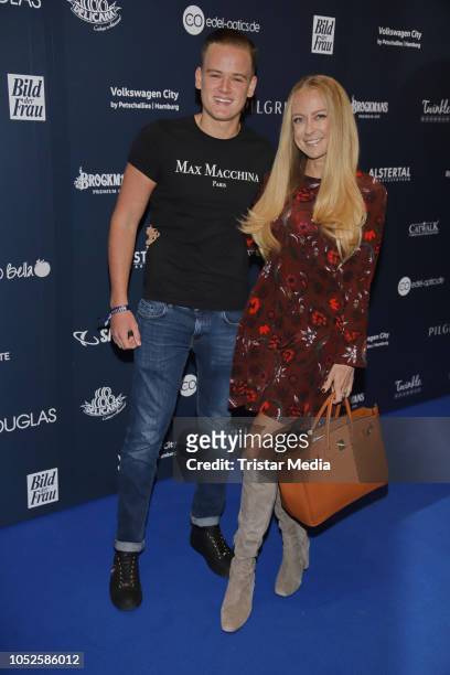 German actress Jenny Elvers and her son Paul Jolig attend the Late Night Shopping party on October 19, 2018 in Hamburg, Germany.