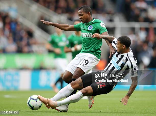 Deandre Yedlin of Newcastle United tackles Jose Izquierdo of Brighton and Hove Albion during the Premier League match between Newcastle United and...