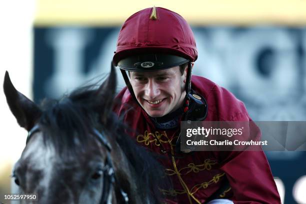 Oisin Murphy celebrates after he rides Roaring Lion to win The Queen Elizabeth II Stakes during QIPCO British Champions Day at Ascot Racecourse on...