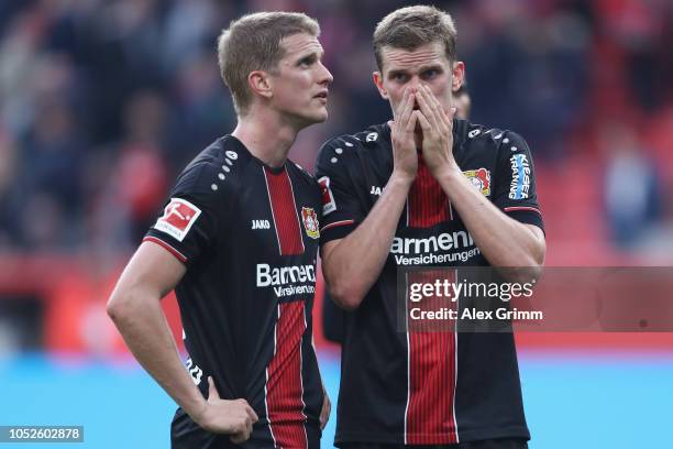 Lars Bender and Sven Bender of Leverkusen react after the Bundesliga match between Bayer 04 Leverkusen and Hannover 96 at BayArena on October 20,...