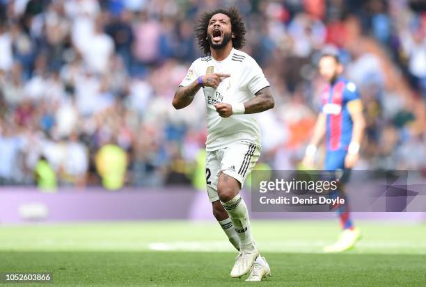 Marcelo of Real Madrid celebrates after scoring his teams opening goal during the La Liga match between Real Madrid CF and Levante UD at Estadio...