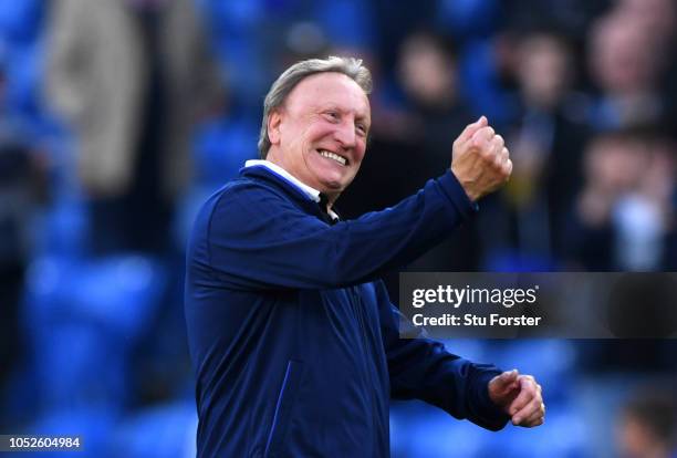 Neil Warnock, Manager of Cardiff City celebrates victory after the Premier League match between Cardiff City and Fulham FC at Cardiff City Stadium on...