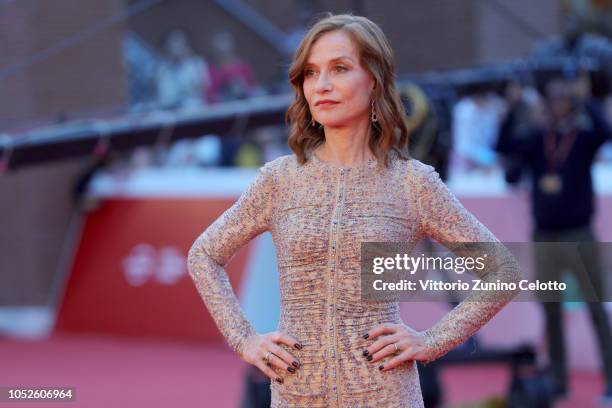 Isabelle Huppert walks a red carpet during the 13th Rome Film Fest at Auditorium Parco Della Musica on October 20, 2018 in Rome, Italy.
