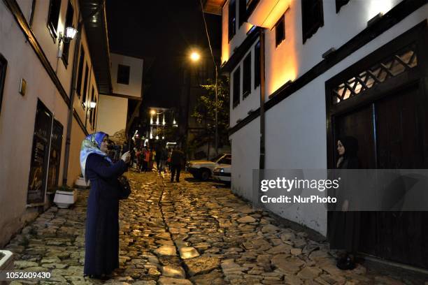 Tourists take pictures in Safranbolu town in the northern city of Karabuk, Turkey on October 20, 2018. Safranbolu had become a UNESCO World Heritage...