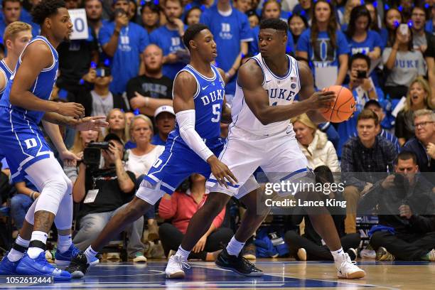 Zion Williamson moves the ball against RJ Barrett of the Duke Blue Devils during Countdown to Craziness at Cameron Indoor Stadium on October 19, 2018...