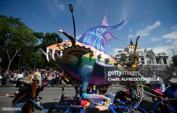 View of "Alebrijes" -Mexican folk art traditional sculptures representing fantastical creatures - during the tenth Monumental "Alebrijes" Parade and...