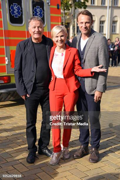 Thomas Ruehmann, Andrea Kathrin Loewig and Bernhard Bettermann attend the ARD TV series 'In aller Freundschaft' 20 years anniversary fanfest at Media...