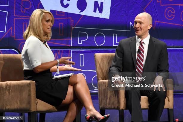 Scottie Nell Hughes and Carter Page speak onstage at Politicon 2018 at Los Angeles Convention Center on October 20, 2018 in Los Angeles, California.