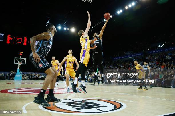 Corey Webster of the Breakers goes up against David Wear of the Kings during the round two NBL match between the New Zealand Breakers and the Sydney...
