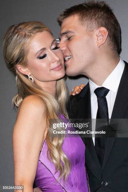 Paris Hilton and Chris Zylka attend Paris Hilton ProDNA lunch party at Just Cavalli Cafe on October 20, 2018 in Milan, Italy.